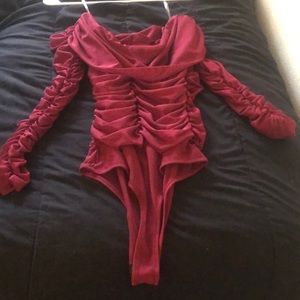 Red off shoulder body suit. From fashion nova